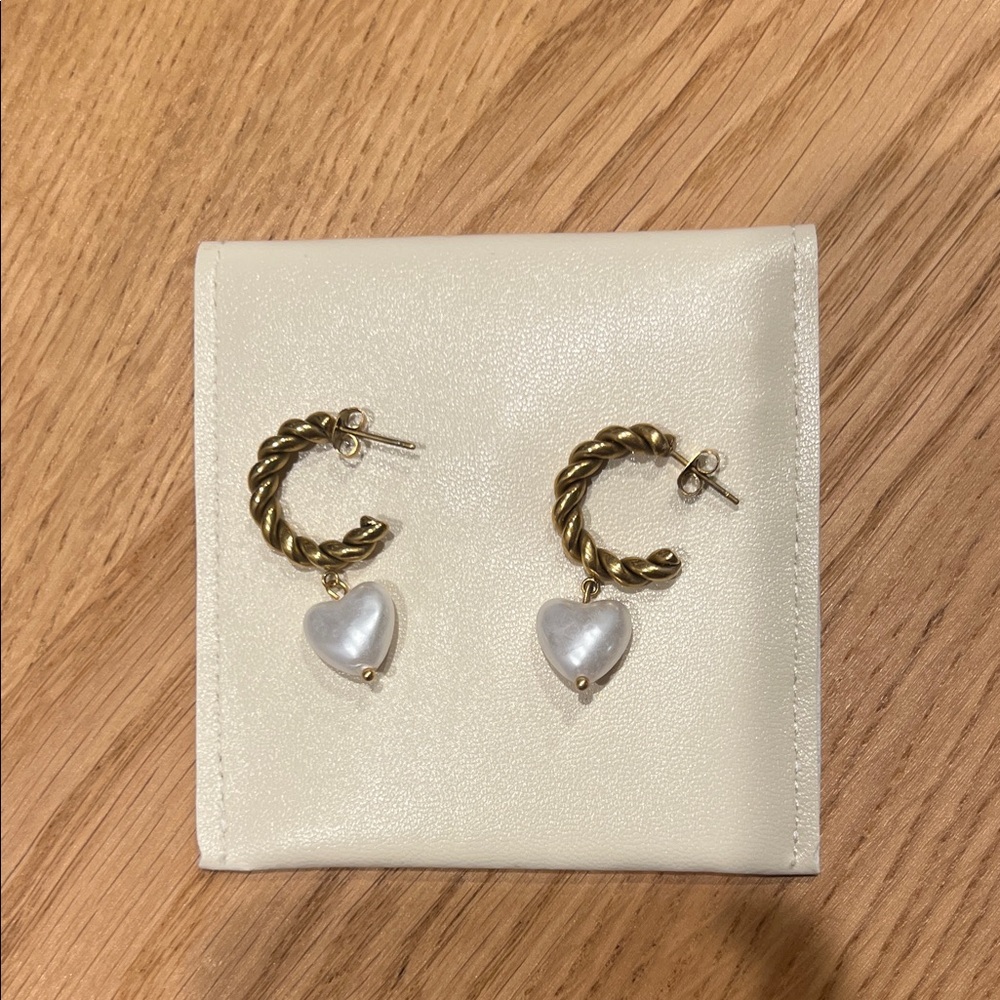 Gold Twisted Hoop Earrings with White Heart Charm